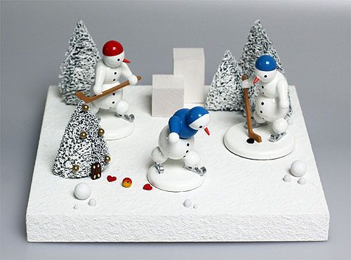 Snowman ice-hockerplayer