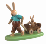 Hasenvater mit Kind auf Bollerwagen
