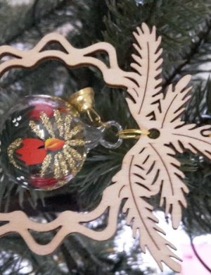 Tree decoration glass ball candle, in the branch