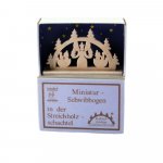 Miniature candle arch light angel in a matchbox