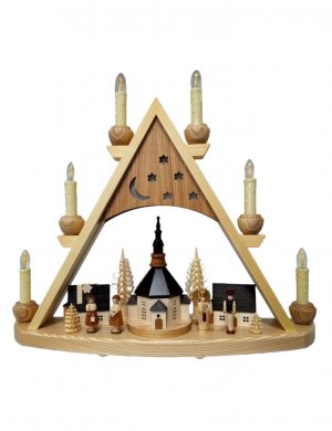 Light gable Seiffen church with carolers