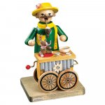 Smoker organ grinder with musical mechanism