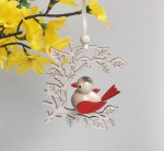 hanging bird in a branch, red