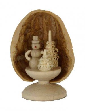 Miniature snowman in walnut shell, standing