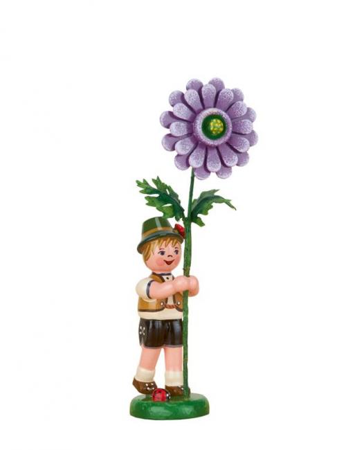 Flower child boy with dahlie