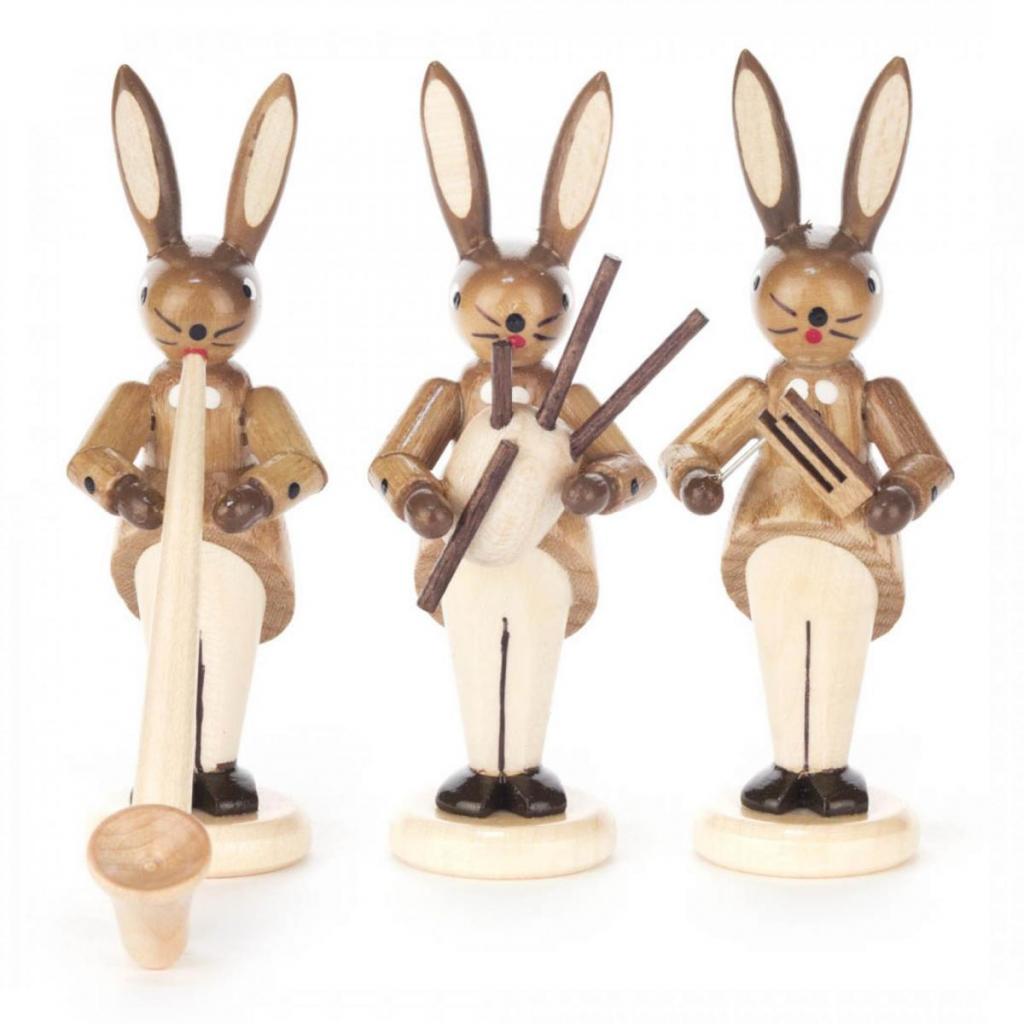 Rabbit trio with alphorn, bagpipe and rattle, nature