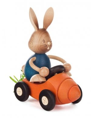 Easter bunny Stupsi in a carrot runner