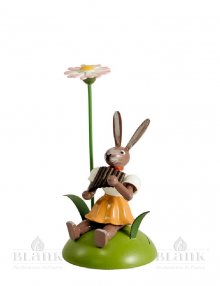Blank Easter bunny sitting with daisies and pan flute