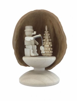 Miniature angler in walnut shell, standing