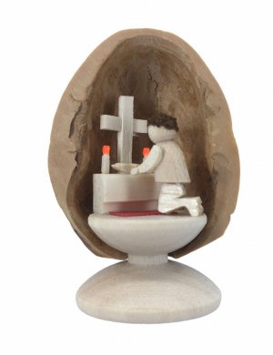 Miniature prayer in walnut shell