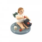 Angel with toy train, sitting, no crown
