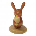 Rabbit on a base with a carrot