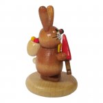 Rabbit on a base with a carrot