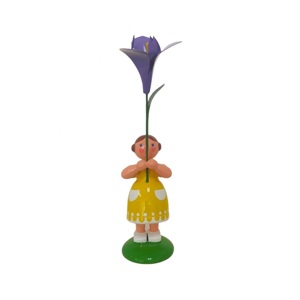 Flower child girl with iris flower