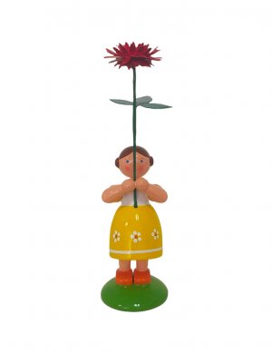 Flower child girl with dahlia