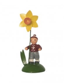 Flower child boy with daffodil