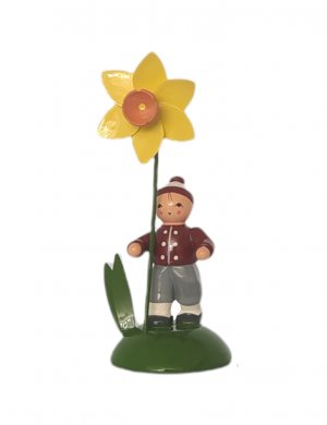 Flower child boy with daffodil