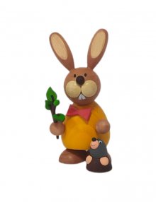 Easter bunny standing with mole and branch