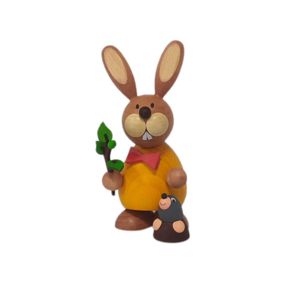 Easter bunny standing with mole and branch