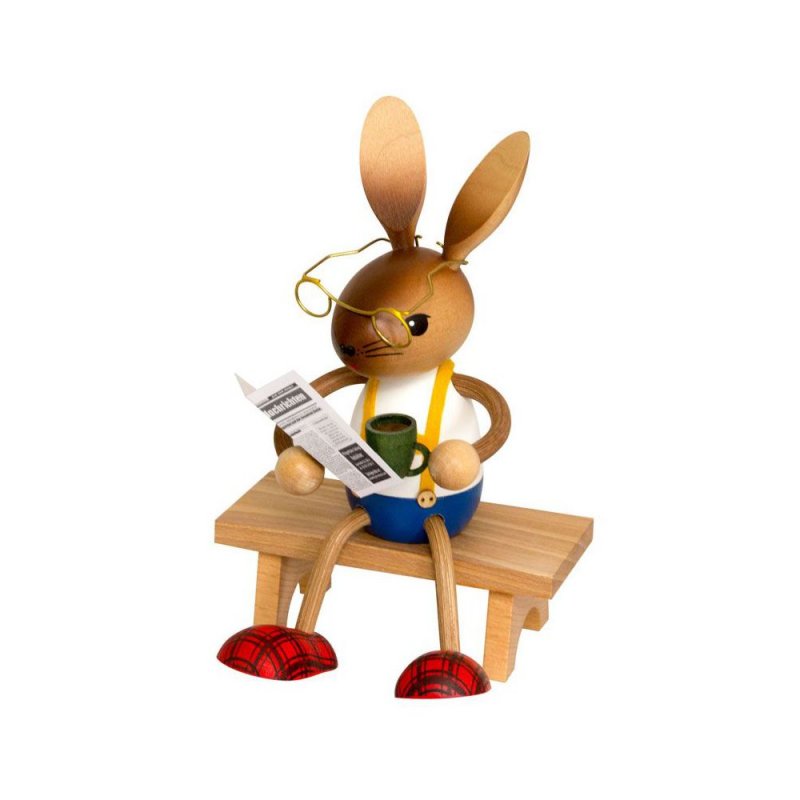 Easter bunny with coffee and newspaper