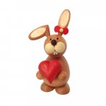 Easter bunny standing with heart
