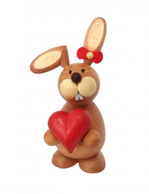 Easter bunny standing with heart