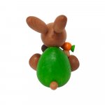 Easter bunny sitting with snail and carrot