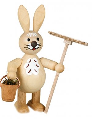 Easter bunny with bucket and rake