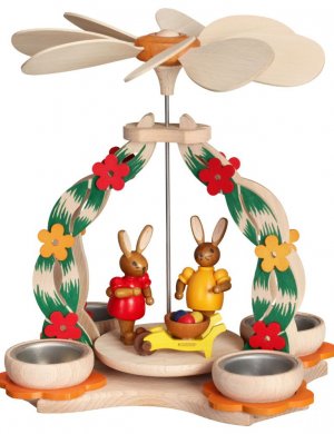 Tealight pyramid with a pair of rabbits and a wheelbarrow