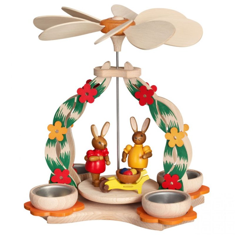 Tealight pyramid with a pair of rabbits and a wheelbarrow