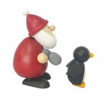 Santa Claus with fish and penguin