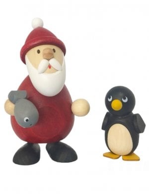 Santa Claus with fish and penguin