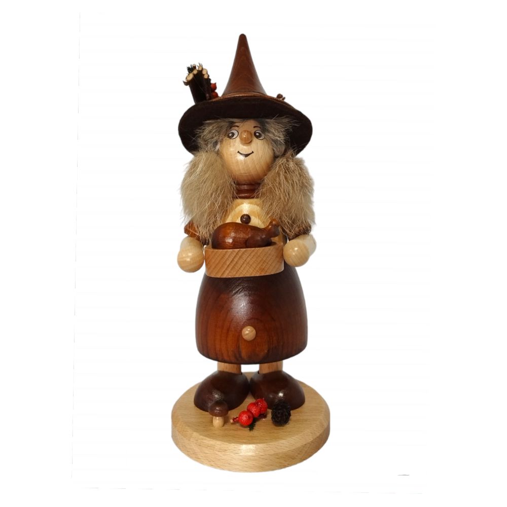 Smoking woman gnome with pan, nature