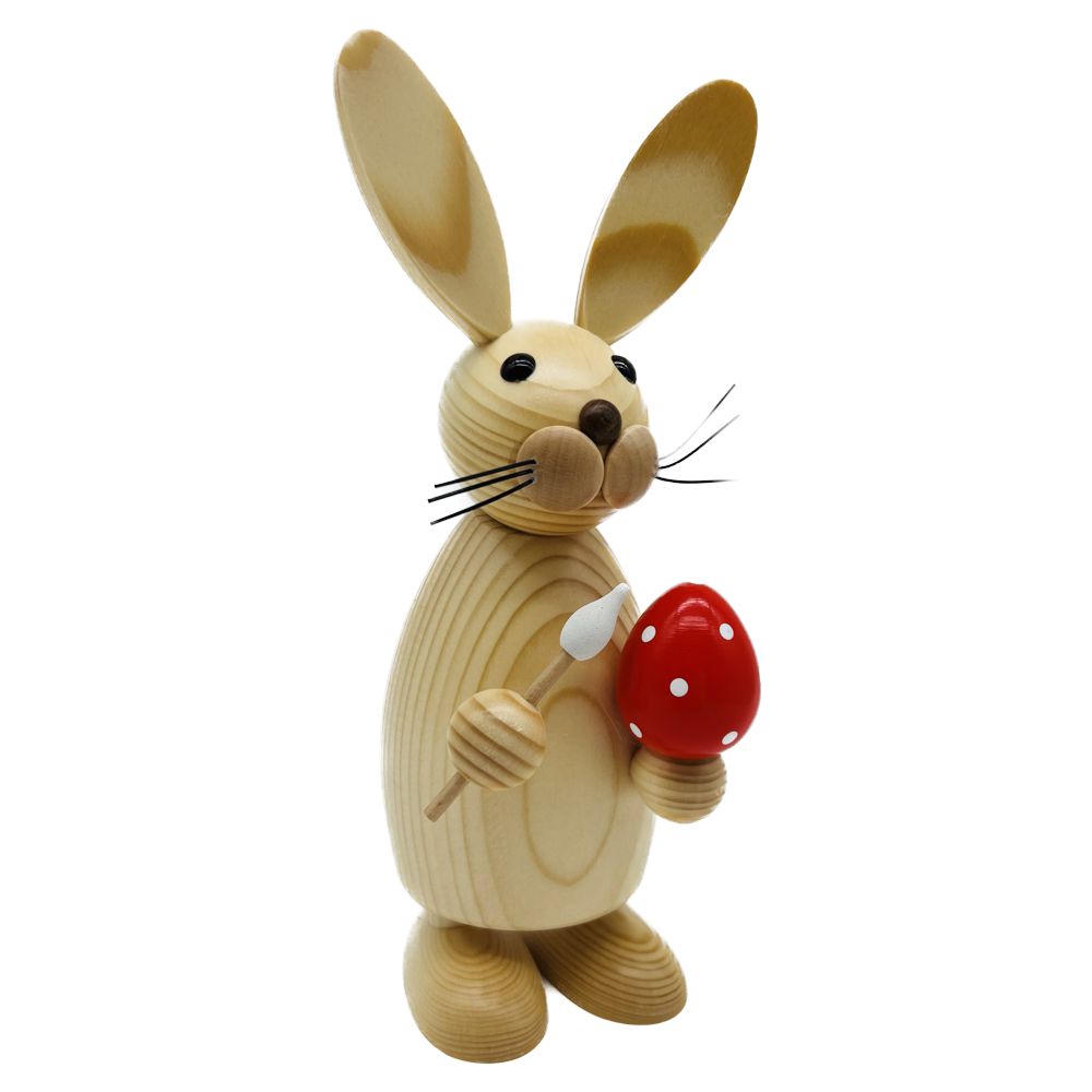 Easter bunny with egg and brush