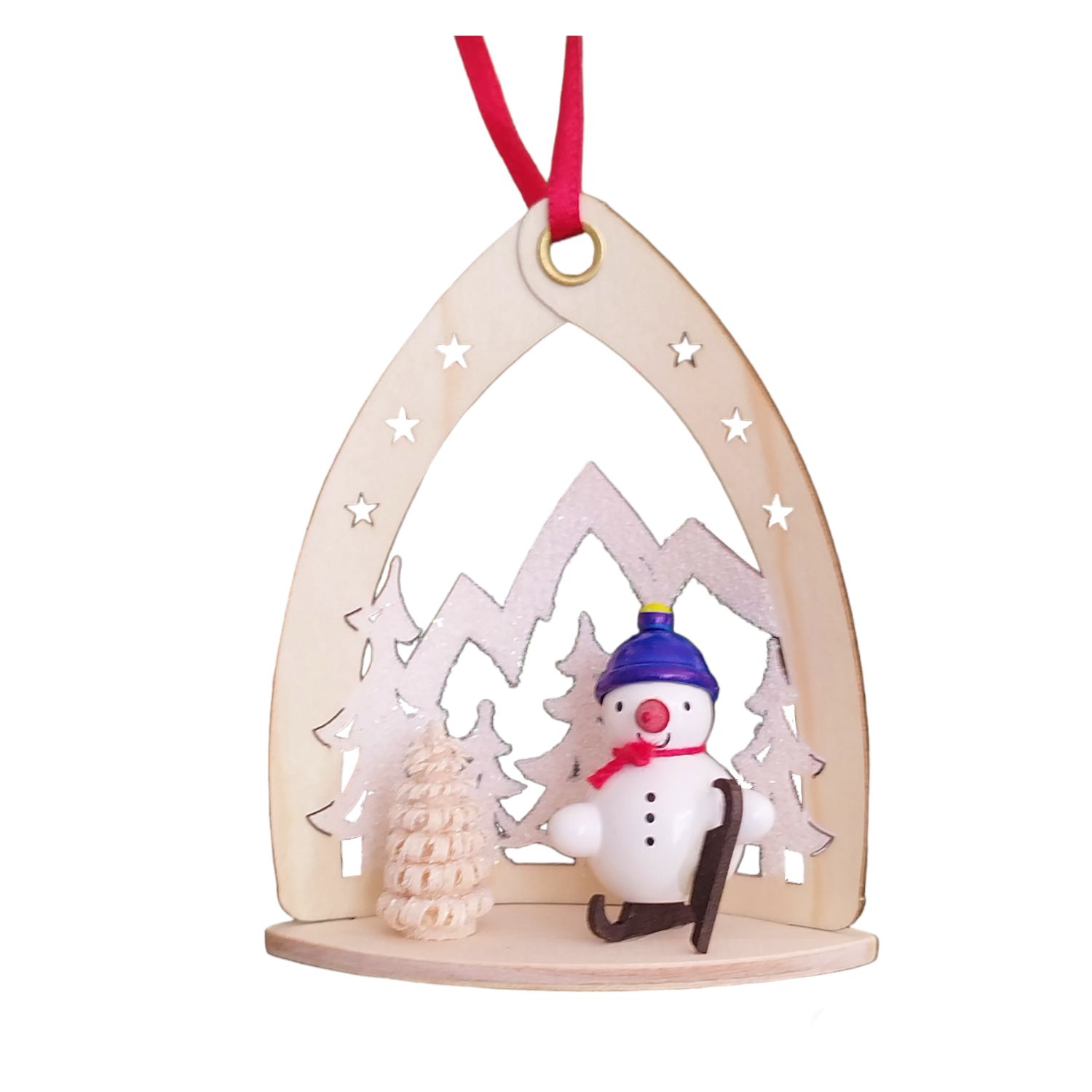 Tree hanging snowman in front of winter landscape, blue